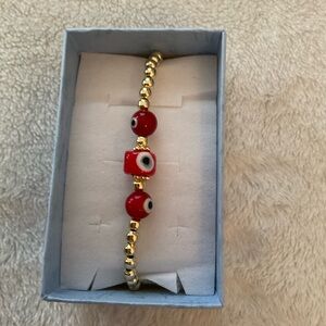 Gold and Red Beaded Evil Eye Bracelet